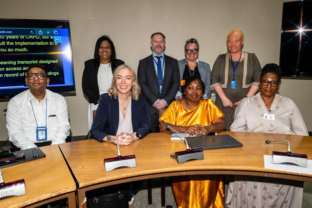Candidate in a photograph with the leaders and other presenters of the Commonwealth Disabled People’s Forum